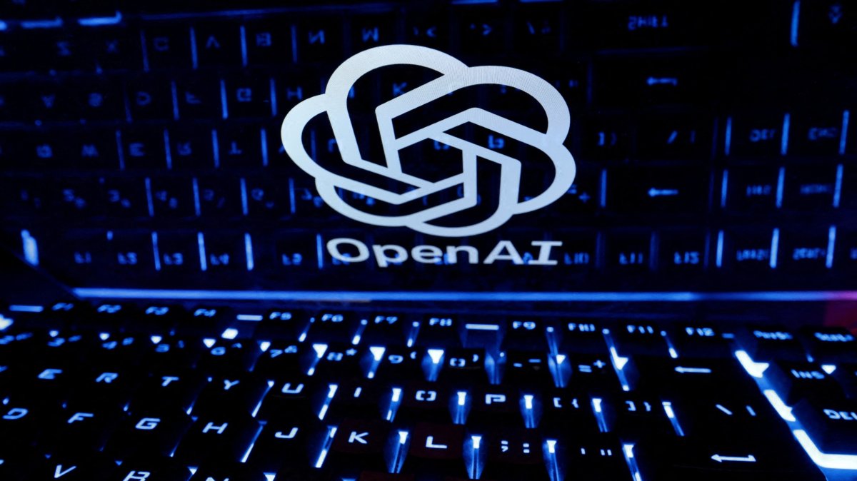 A keyboard is placed in front of a displayed OpenAI logo in this illustration taken, Feb. 21, 2023. (Reuters Photo)