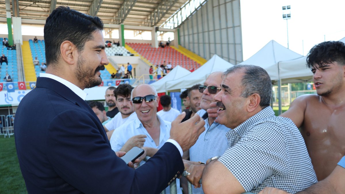 Turkish Wrestling Federation President Taha Akgül (L) attended the 4th Traditional Muhsin Yazıcıoğlu Karakucak Wrestling Festival and Turkish Championship held, Sivas, Türkiye, Sept. 9, 2026. (AA Photo)