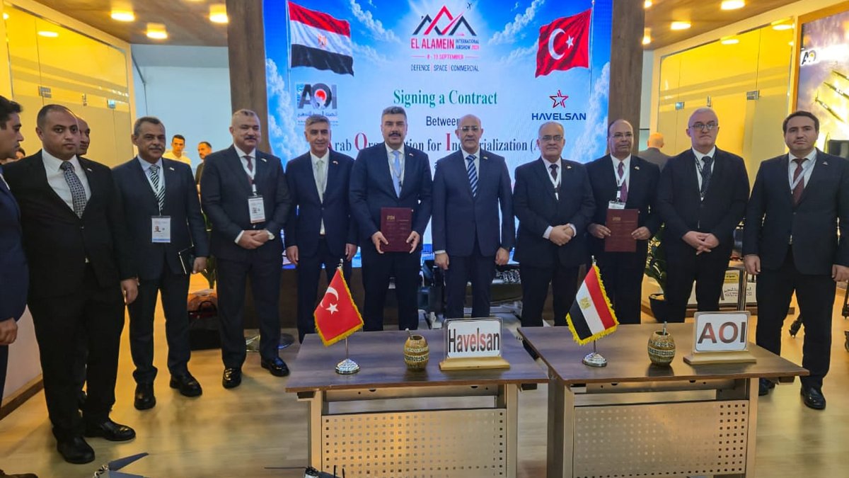 Turkish and Egyptian officials pose during a signing ceremony at El Alamein International Airport, Egypt, Aug. 10, 2026. (AA Photo)