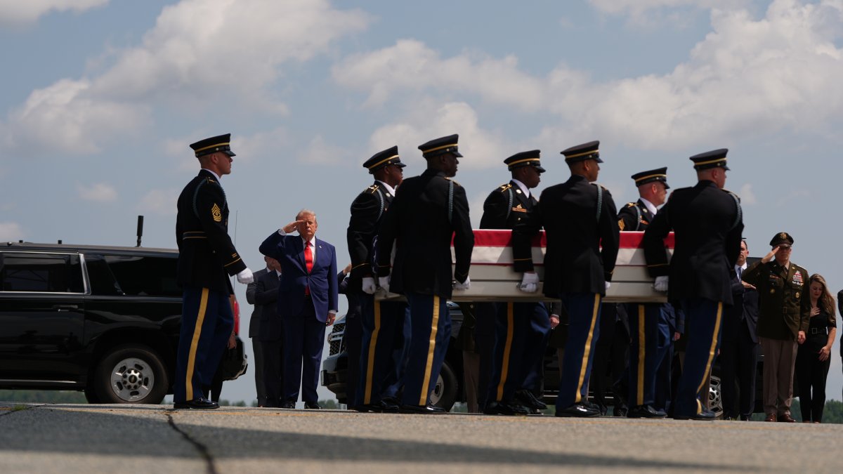 President Donald Trump salutes as a U.S. Army carry team moves a transfer case containing the remains of Pvt. Isabella Gonzales of Carrollton, Texas, July 22, 2026. (AP Photo)