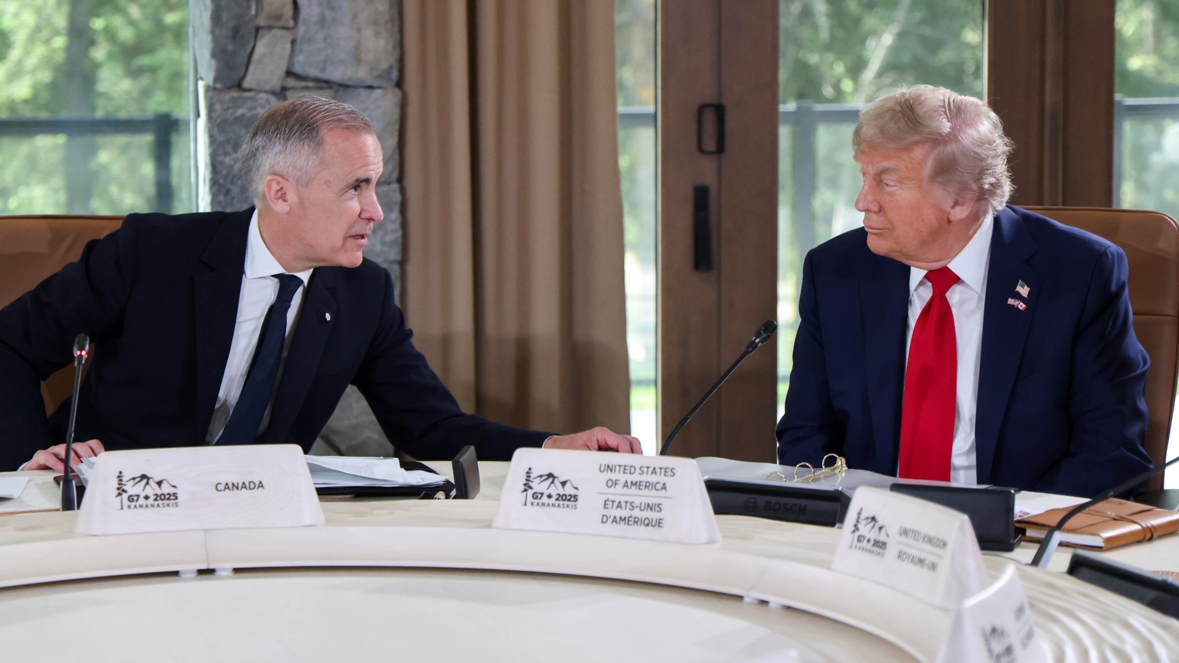 Canadian Prime Minister Mark Carney speaks with U.S. President Donald Trump during a working session at the Group of Seven (G7) Summit at the Pomeroy Kananaskis Mountain Lodge, Alberta, Canada, June 16, 2025. (EPA Photo)