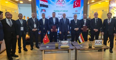 Turkish and Egyptian officials pose during a signing ceremony at El Alamein International Airport, Egypt, Aug. 10, 2026. (AA Photo)