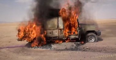 This image taken from video shows a pickup truck burning following an attack on Saudi-backed forces, Jawf province, Yemen, Sept. 9, 2026. (Ansar Allah Media Office via AP)