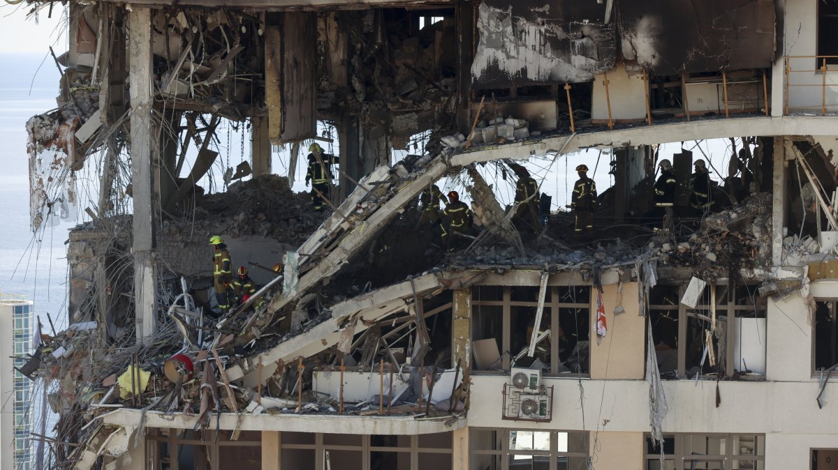 Ukrainian rescuers work amid the rubble at the site of a Russian strike on a multistorey residential building in Odesa, southern Ukraine, Sept. 12, 2026. (EPA Photo)