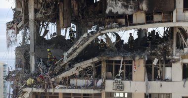 Ukrainian rescuers work amid the rubble at the site of a Russian strike on a multistorey residential building in Odesa, southern Ukraine, Sept. 12, 2026. (EPA Photo)