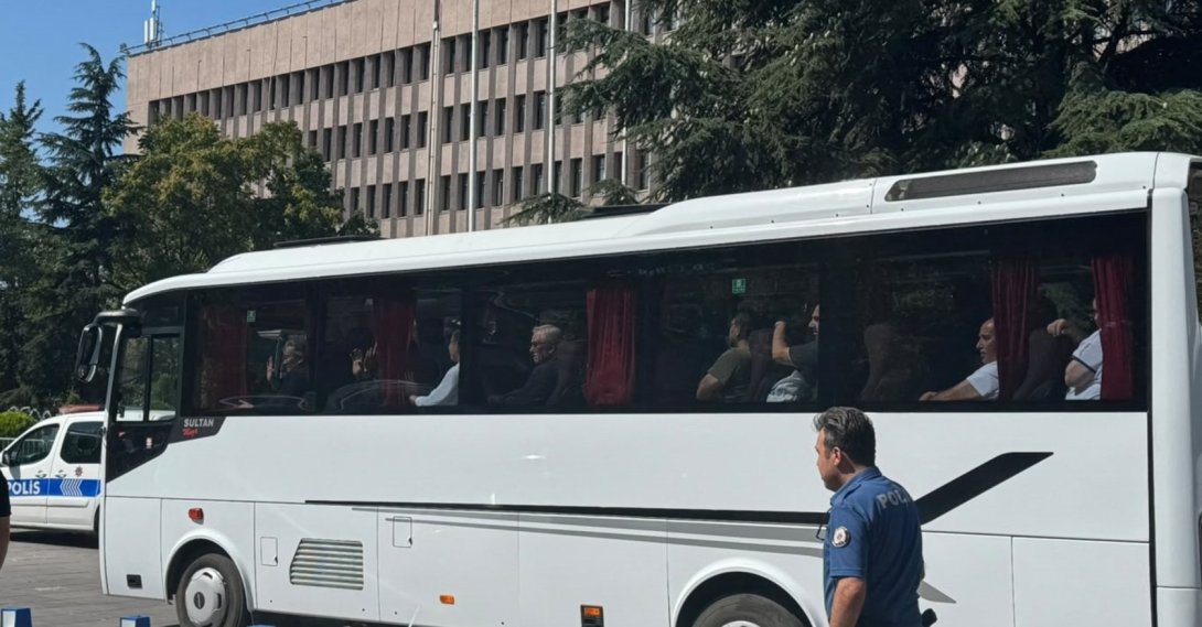 A police bus transports Alihan Kuriş and other suspects after their arrest, Ankara, Türkiye, Aug. 16, 2026. (AA Photo)