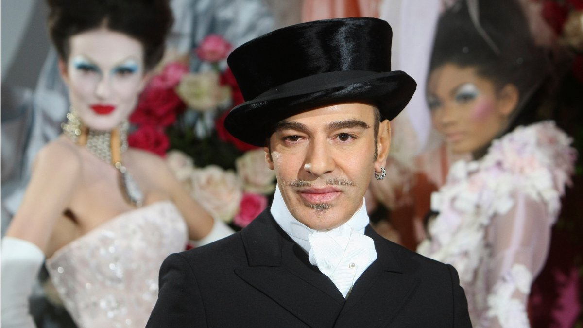 Fashion designer John Galliano poses at the end of the presentation of the Dior Haute Couture spring/summer 2010 fashion collection, Paris, France, Jan. 25, 2010. (AP Photo)