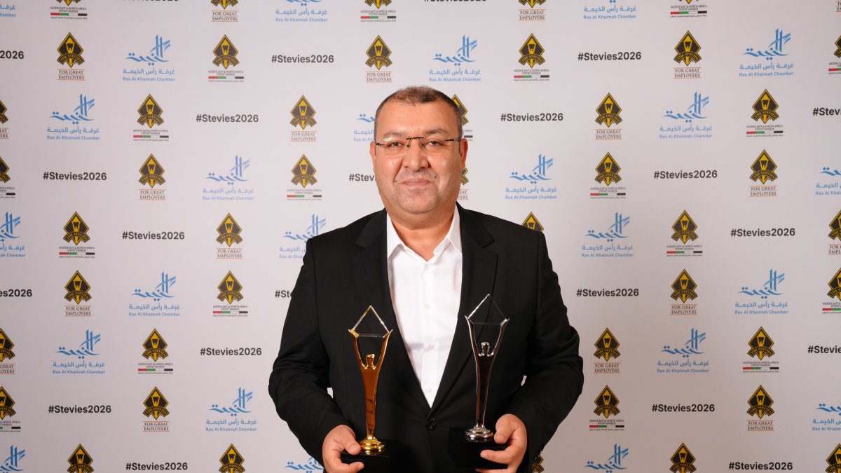 Mustafa Yüce, general manager of Digital Publications at Turkuvaz Media, holds the Stevie Awards, Istanbul, Türkiye, Sept. 11, 2026. (AA Photo)