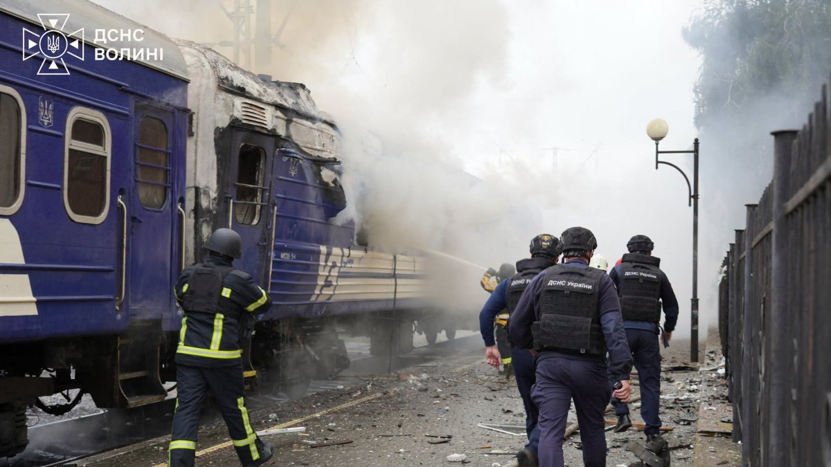 firefighters extinguish fire at a train carriage damaged by a drone strike near the border with Poland, Sept. 12, 2026. (AFP Photo)