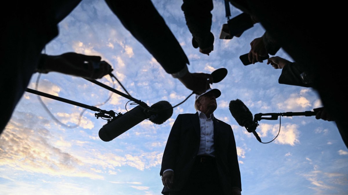 U.S. President Donald Trump speaks to members of the media before boarding Air Force One to leave from Shannon Airport after attending the final day of the Irish Open golf tournament in nearby Doonbeg, Ireland, Sept. 13, 2026. (AFP Photo)