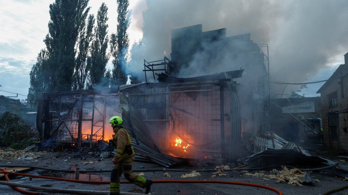 Firefighters work at the site of a non-residential building hit by a Russian drone strike, amid Russia's attack on Ukraine, in Kyiv, Ukraine, Sept. 11, 2026. (Reuters Photo)