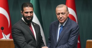 President Recep Tayyip Erdoğan shakes hands with Syrian President Ahmad al-Sharaa during a joint press conference following their meeting, Ankara, Türkiye, Feb. 4, 2025. (AP Photo)