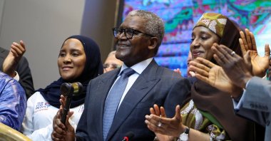 Aliko Dangote, president and CEO of Dangote Group, holds a gavel during the opening day of Dangote Refinery's IPO at the Nigerian Exchange Group, Marina, Lagos, Nigeria, Sept. 14, 2026. (Reuters Photo)