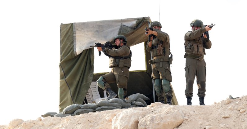 Israeli soldiers provide security during the inauguration of the new illegal Israeli outpost settlement near the Palestinian village of Dura, Hebron, occupied West Bank, Palestine, Aug. 31, 2026. (EPA Photo)