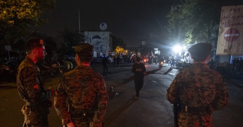 Iranian police officers monitor an area outside the Imam Khomeini Grand Mosque on the eve of a funeral in Tehran, Iran, on July 5, 2026. (AFP File Photo)