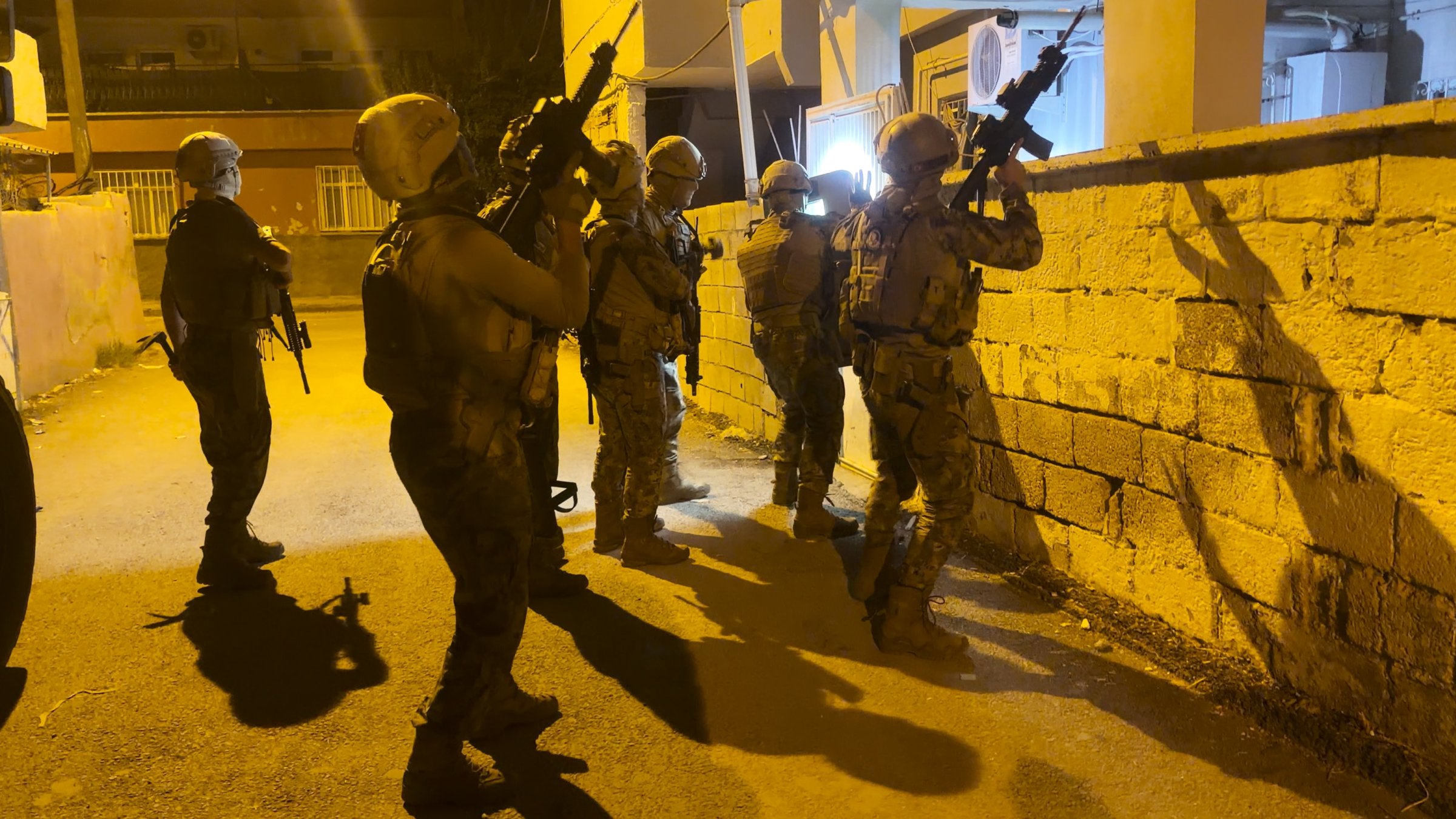 Police officers raid a location in a counterterrorism operation, Adıyaman, eastern Türkiye, Sept. 14, 2026. (AA Photo)