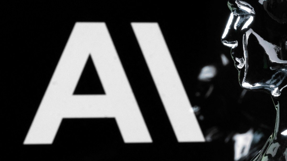 This photograph shows a figurine in front of the Anthropic logo, Paris, France, Feb. 13, 2026. (AFP Photo)