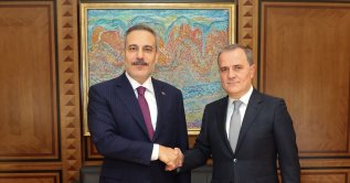 Foreign Minister Hakan Fidan (L) shakes hands with Azerbaijani Foreign Minister Jeyhun Bayramov, Baku, Azerbaijan, Sept. 15, 2026. (AA Photo)