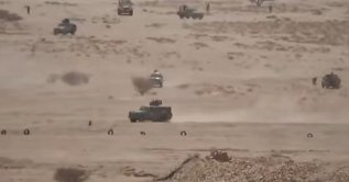 Vehicles belonging to Saudi-backed forces being attacked by Houthi fighters in the desert of eastern Jawf, Yemen, Sept. 15, 2026. (Ansar Allah Media Office via AP)