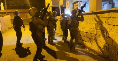 Police officers raid a location in a counterterrorism operation, Adıyaman, eastern Türkiye, Sept. 14, 2026. (AA Photo)