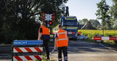 Contractor employees work along the railway line as no trains were running in parts of the country due to a disruption caused by sabotage, Holten, Netherlands, Sept. 15, 2026. (EPA Photo)