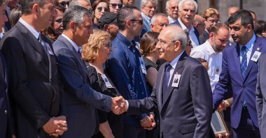 CHP Chair Kemal Kılıçdaroğlu (R) shakes hands with Özgür Özel during a funeral ceremony, Ankara, Türkiye, June 25, 2026. (AA Photo)