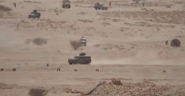 Vehicles belonging to Saudi-backed forces being attacked by Houthi fighters in the desert of eastern Jawf, Yemen, Sept. 15, 2026. (Ansar Allah Media Office via AP)