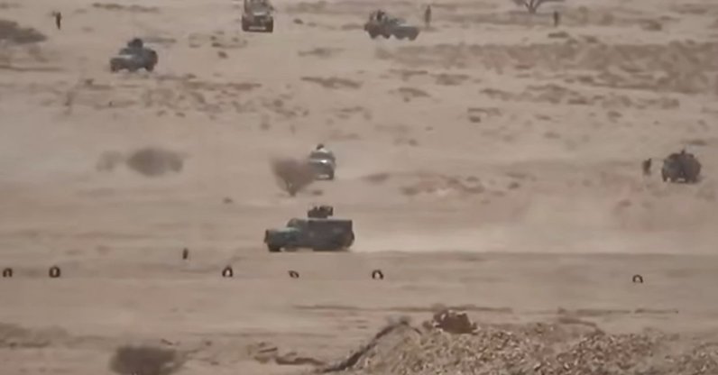 Vehicles belonging to Saudi-backed forces being attacked by Houthi fighters in the desert of eastern Jawf, Yemen, Sept. 15, 2026. (Ansar Allah Media Office via AP)