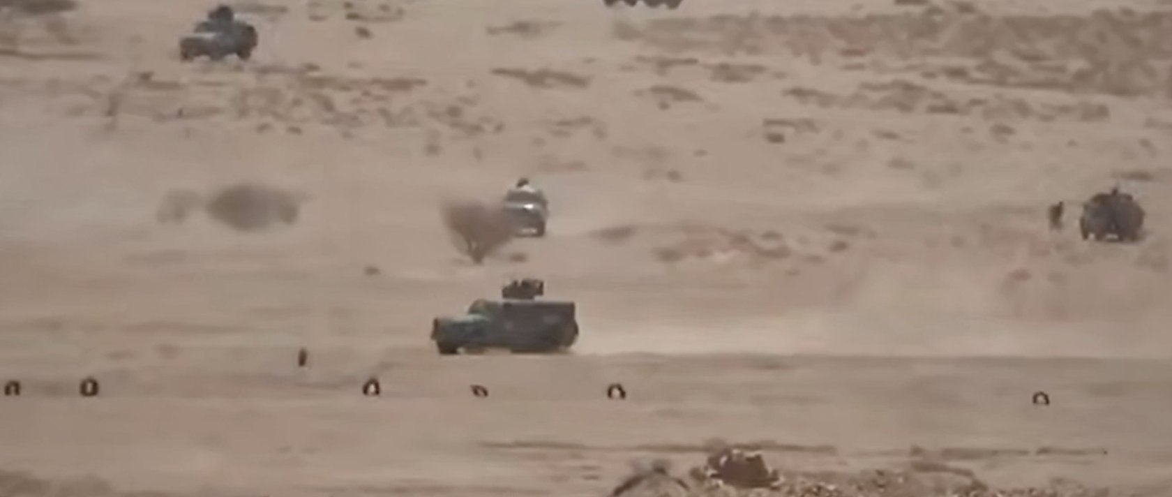 Vehicles belonging to Saudi-backed forces being attacked by Houthi fighters in the desert of eastern Jawf, Yemen, Sept. 15, 2026. (Ansar Allah Media Office via AP)