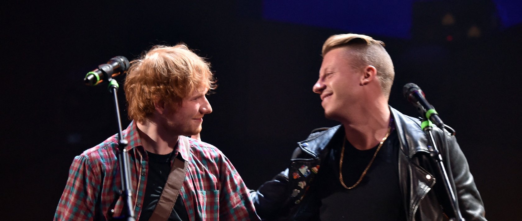 Recording artists Ed Sheeran and Macklemore perform onstage during the 2014 iHeartRadio Music Festival at the MGM Grand Garden Arena, Las Vegas, Sept. 20, 2014. (AFP File Photo)