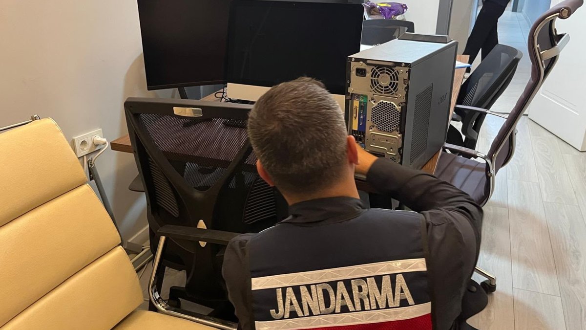 Gendarmerie officers conduct inspections during a cyber espionage operation, Ankara, Türkiye, Sept. 15, 2026. (AA Photo)