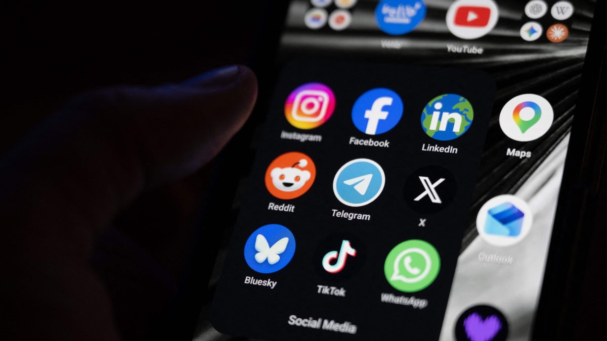 This photograph shows a set up smartphone screen displaying the logo of main social media platforms, Paris, France, April 29, 2026. (AFP Photo)