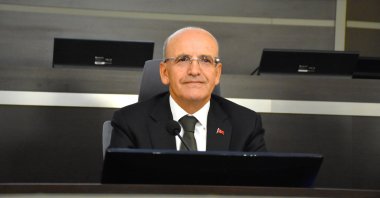Treasury and Finance Minister Mehmet Şimşek during a meeting with businesspeople, Aksaray, central Türkiye, Sept. 15, 2026. (AA Photo)