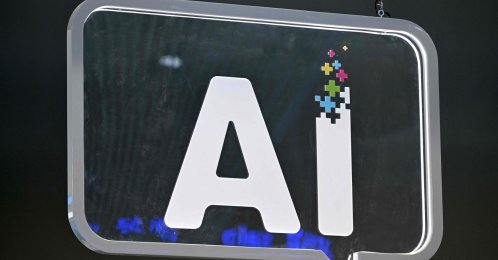 The wording "AI" is pictured at the Mobile World Congress (MWC), Barcelona, Spain, Feb. 27, 2024. (AFP Photo)