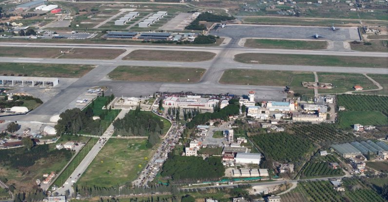 This aerial picture shows cars queing as civilians take refuge from violence at the Hmeimim Russian base in Syria's Latakia Mediterranean province on March 11, 2025. (AFP File Photo)