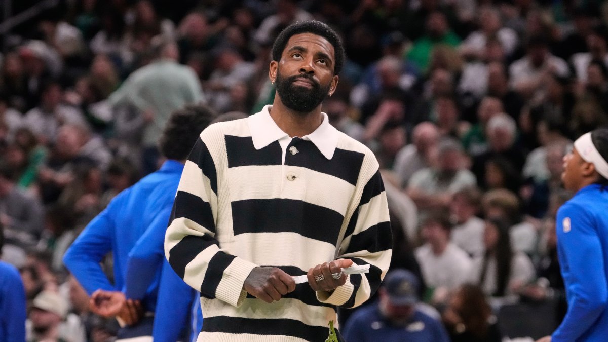 Dallas Mavericks guard Kyrie Irving on the bench during an NBA basketball game, in Boston, U.S., March 6, 2026. (AP Photo)