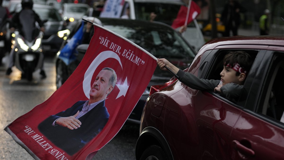 Supporters of President Recep Tayyip Erdoğan celebrate outside AK Party offices, Istanbul, Türkiye, May 28, 2023. (AP Photo)