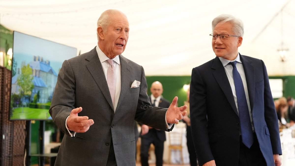 Britain's King Charles walks with Nvidia CEO Jensen Huang to a meeting for leaders from the AI sector, governments and thought leaders to discuss how AI can be developed and deployed in ways that benefit society, at Dumfries House in Cumnock, Britain, Sept. 17, 2026. (Reuters Photo)
