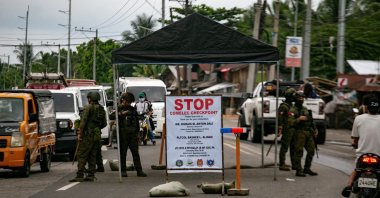 Philippine Army soldiers man an election checkpoint in Sultan Kudarat, a day before the first parliamentary elections of Bangsamoro Autonomous Region, in Maguindanao del Norte, Philippines, Sept. 13, 2026. (Reuters Photo)