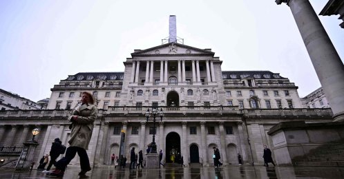 Pedestrians walk past the Bank of England in London, U.K., Feb. 5, 2026. (AFP Photo)