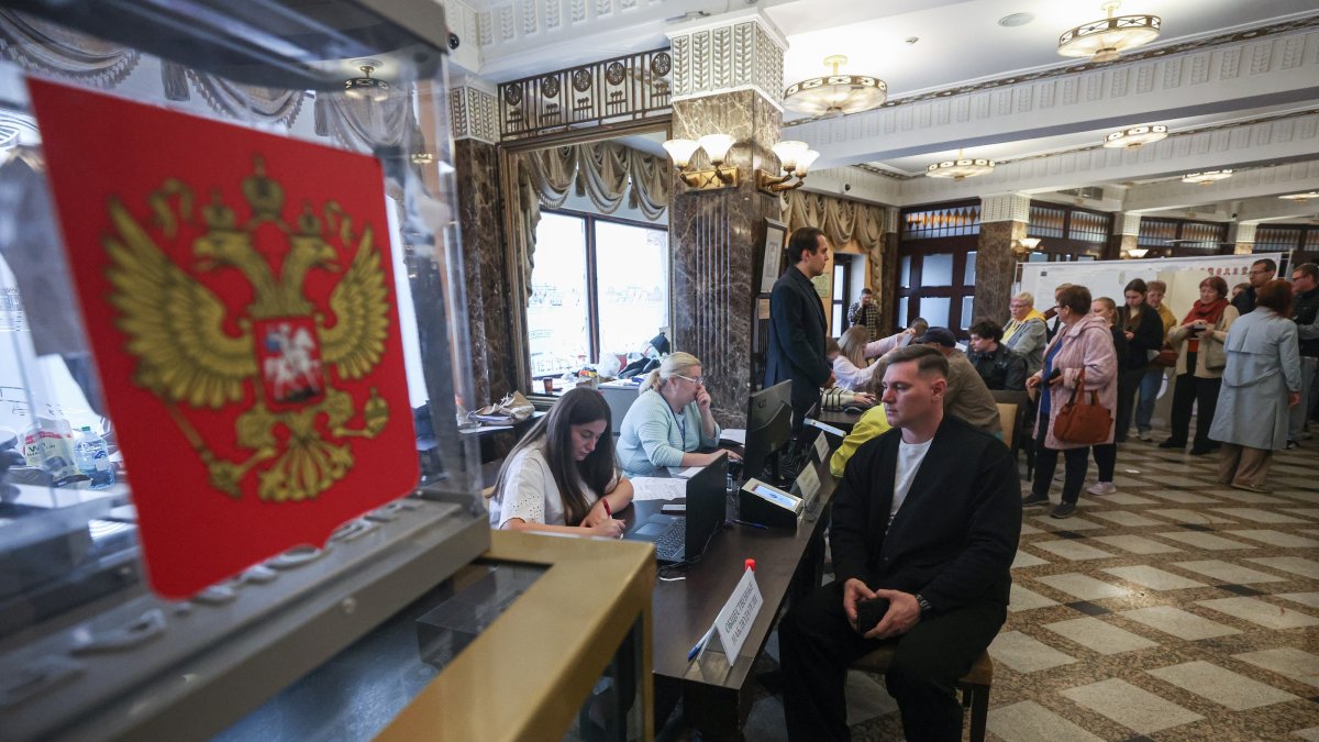 People take part in voting at a polling station, Moscow, Russia, Sept. 18, 2026. (EPA Photo)