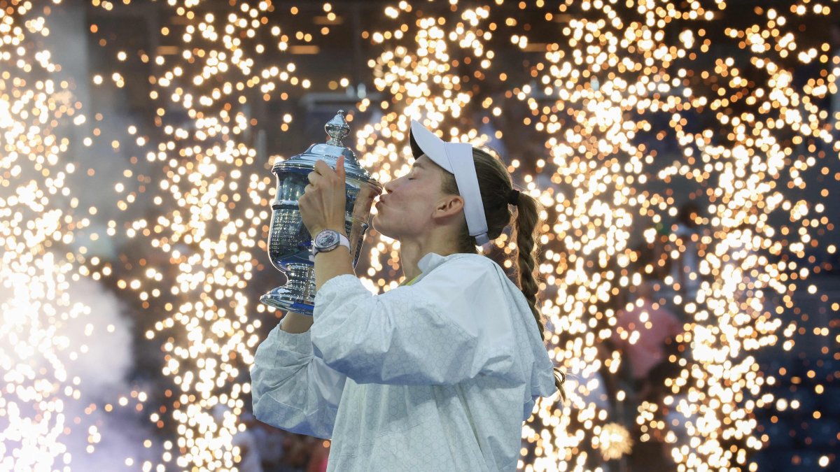 Kazakhstan's Elena Rybakina kisses the winner's trophy after winning the women's singles final tennis match against Belarus's Aryna Sabalenka on day fourteen of the US Open tennis tournament at the USTA Billie Jean King National Tennis Center, New York City, U.S., Sept. 12, 2026. (AFP Photo)
