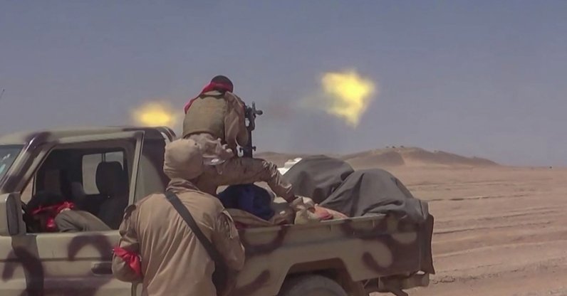 This frame grab, taken from AFPTV video footage, shows fighters affiliated with the Saudi-backed Yemeni government engaging in clashes with Houthi authorities in Al-Jawf province, Sept. 15, 2026. (AFP Photo)