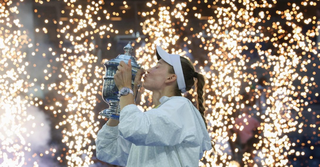 Kazakhstan's Elena Rybakina kisses the winner's trophy after winning the women's singles final tennis match against Belarus's Aryna Sabalenka on day fourteen of the US Open tennis tournament at the USTA Billie Jean King National Tennis Center, New York City, U.S., Sept. 12, 2026. (AFP Photo)