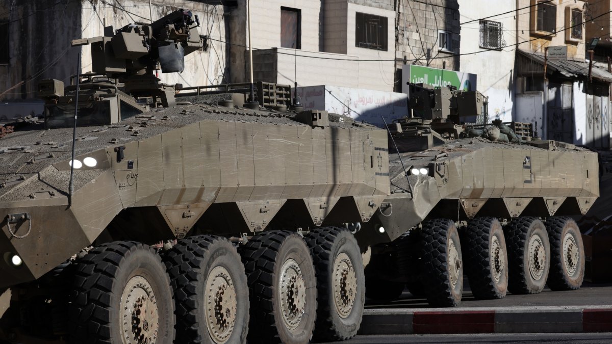Israeli armored personnel carriers block the entrance of Al-Ain refugee camp during a military operation west of the West Bank, Nablus, Palestine, Sept. 17, 2026. (EPA Photo)