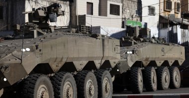 Israeli armored personnel carriers block the entrance of Al-Ain refugee camp during a military operation west of the West Bank, Nablus, Palestine, Sept. 17, 2026. (EPA Photo)