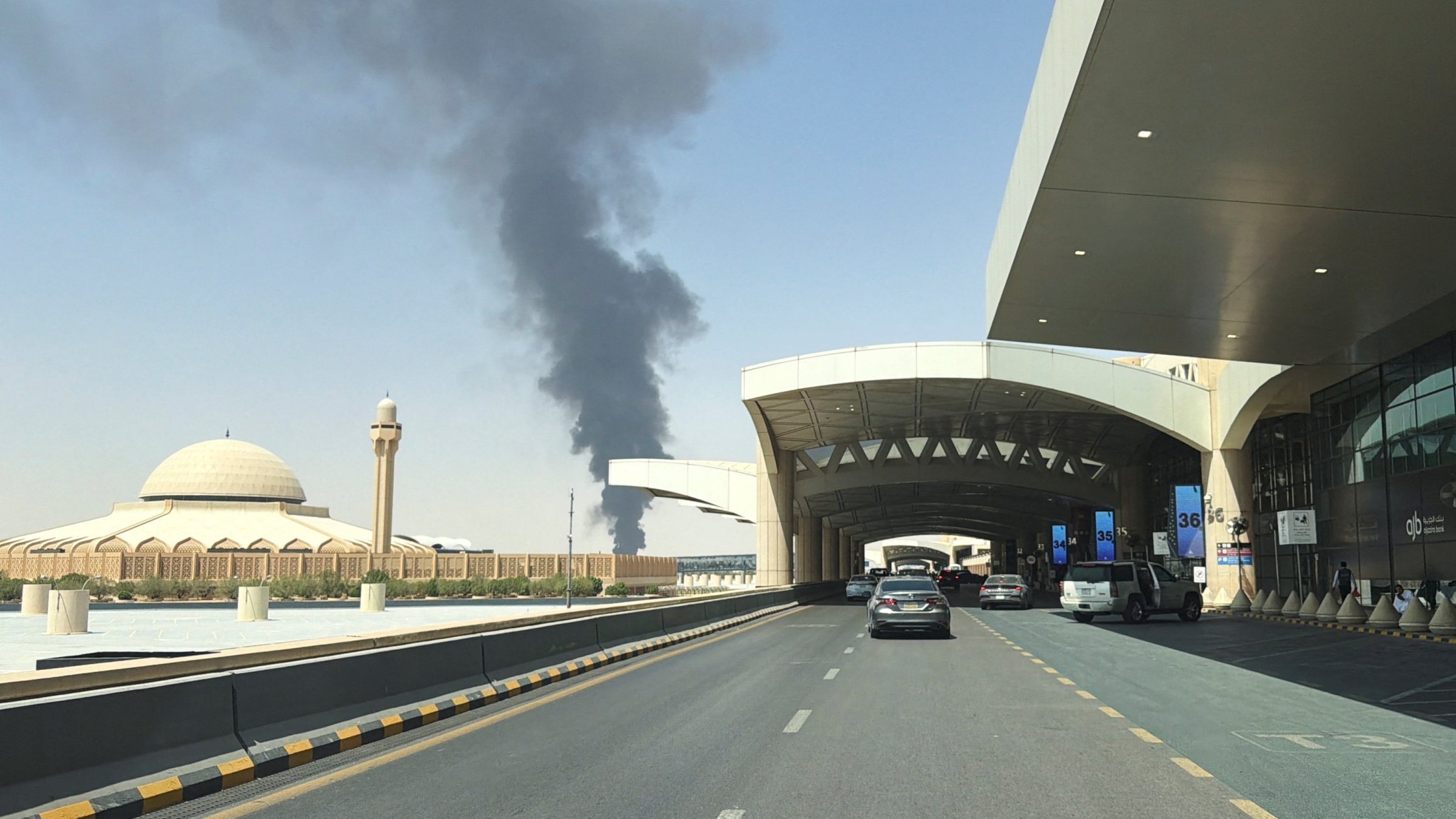 Smoke rises from the fuel storage depot at King Khalid International Airport in the aftermath of Houthi strikes, Riyadh, Saudi Arabia, Sept. 19, 2026. (Reuters Photo)