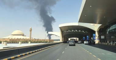 Smoke rises from the fuel storage depot at King Khalid International Airport in the aftermath of Houthi strikes, Riyadh, Saudi Arabia, Sept. 19, 2026. (Reuters Photo)