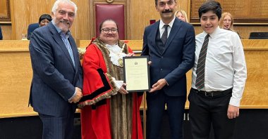 Onur Inci (2nd R) receives the Merton Heroes Award from the Merton Council, London, U.K., Sept. 16, 2026. (Photo courtesy of Alpaslan Düven)