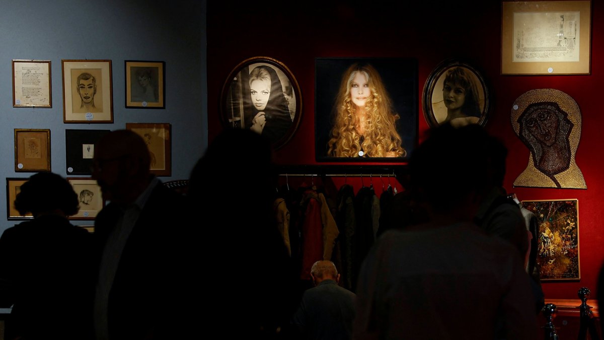 Visitors walk through a preview exhibition of personal belongings once owned by the late French actress Brigitte Bardot, Maison Drouot, Paris, France, Sept. 15, 2026. (AFP Photo)